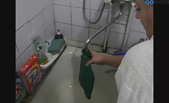 Woman Enjoys Wet and Wild Bathroom Adventure with Eager Man